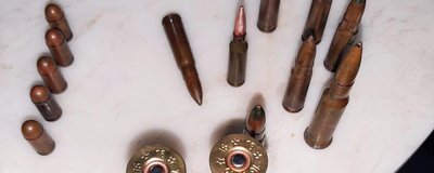 У миколаївця виявили зброю, набої різного калібру та наркотики